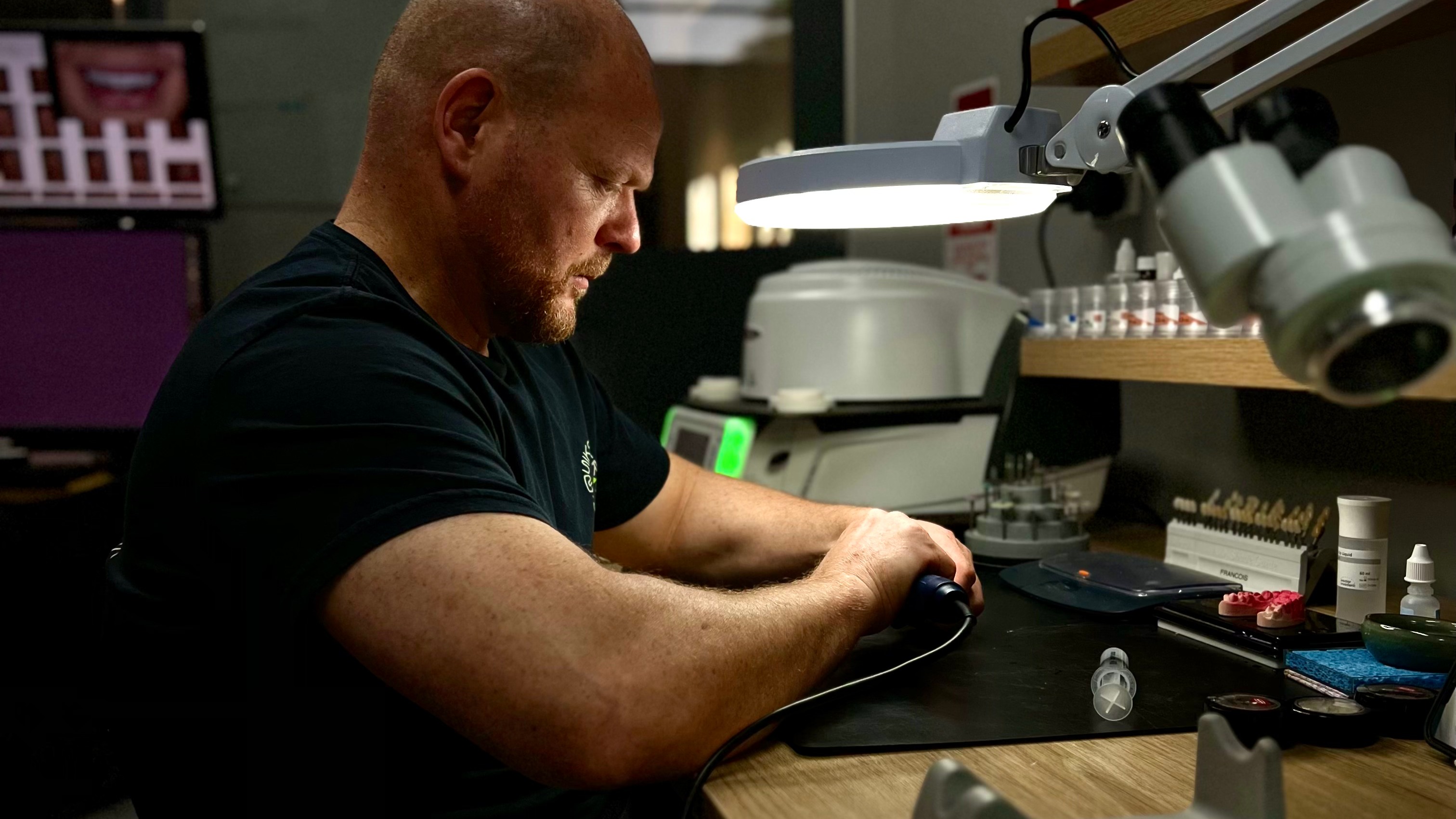 Francois – Master Ceramist at Vogue Dental at his desk