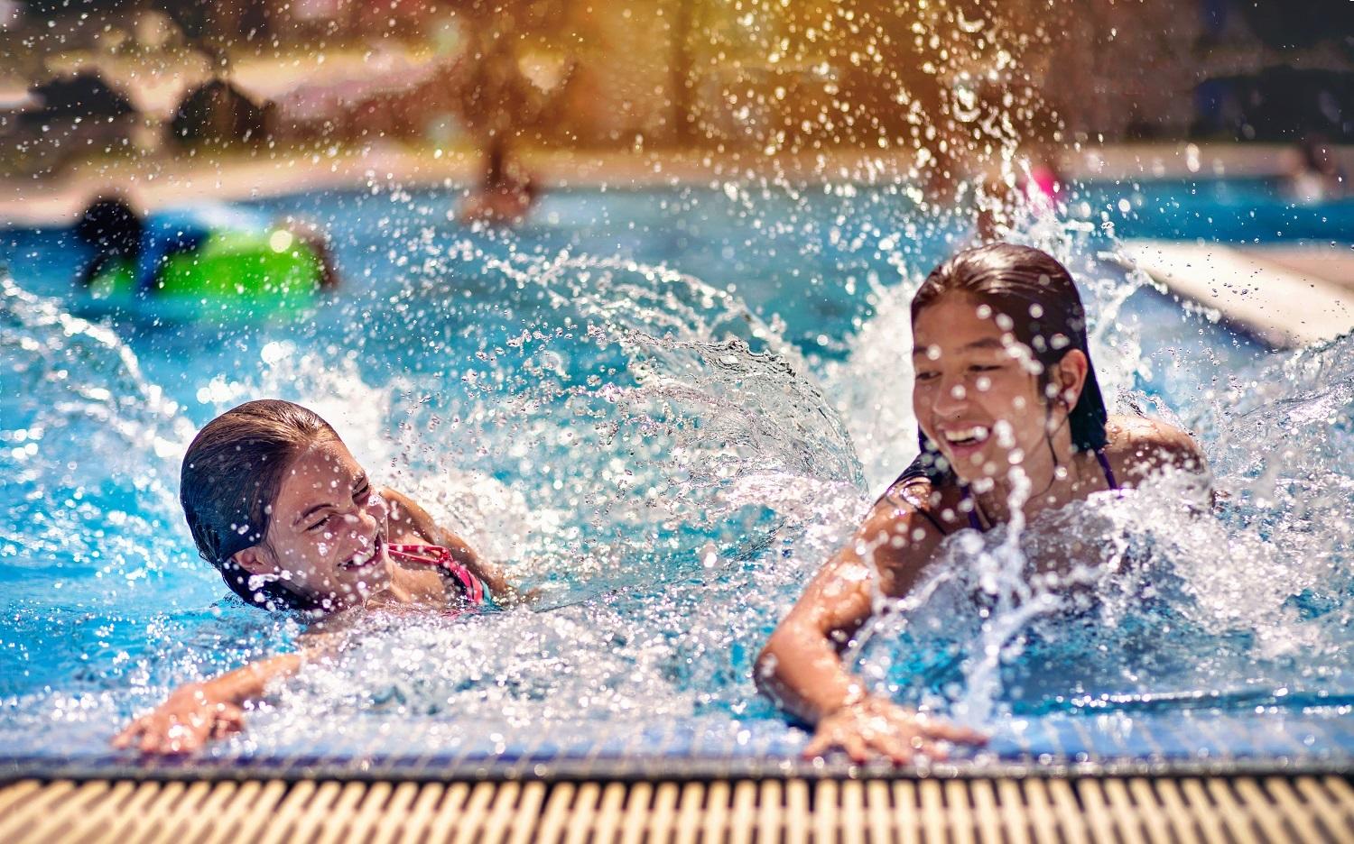 children playing in a swimming pool