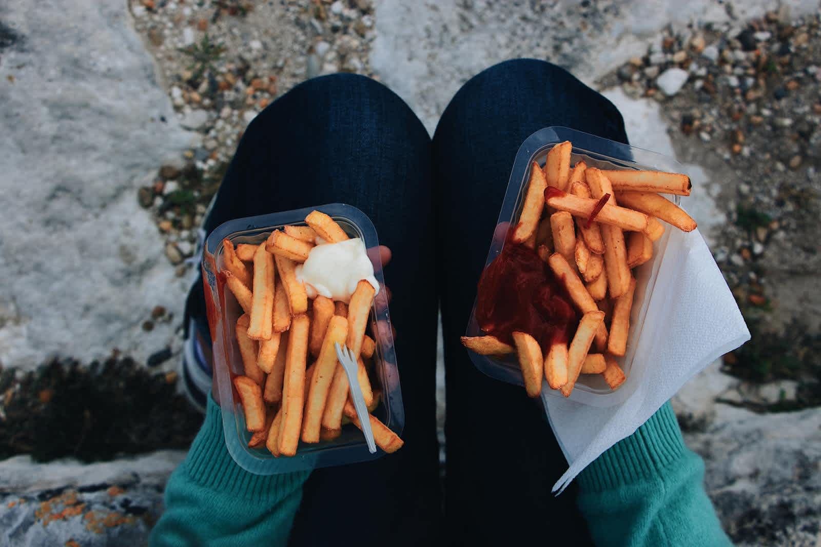 photo-of-person-holding-fries-3098841 - 