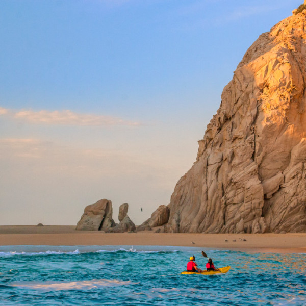Swoop | a picture of Los Cabos, Mexico by the beach with two people in a kayak