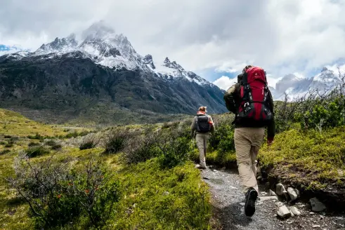 Hikers approach a mountain