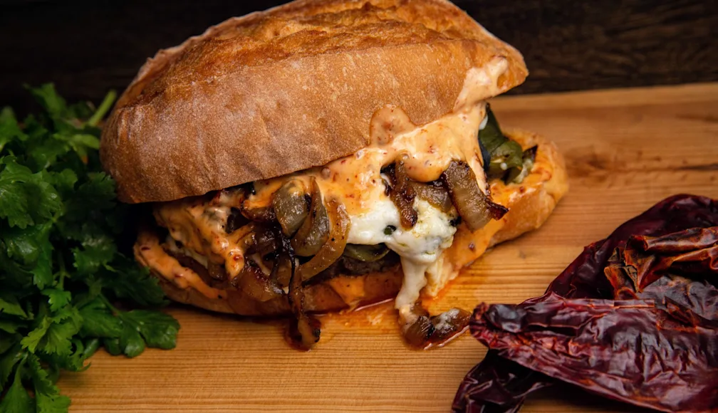 Venison chorizo torta on a cutting board.