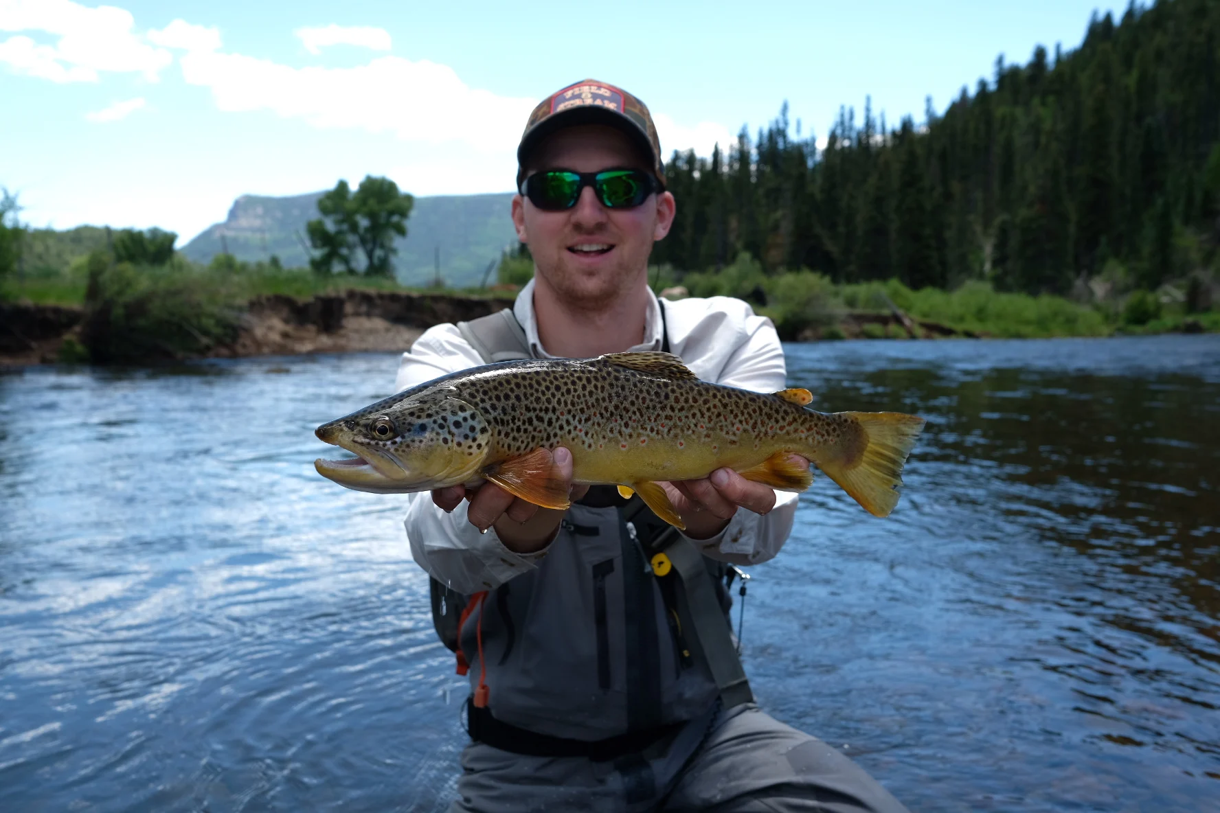 Ryan Chelius with a brown trout