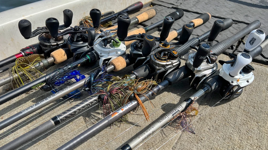 Seven fishing rods on the deck of a bass boat