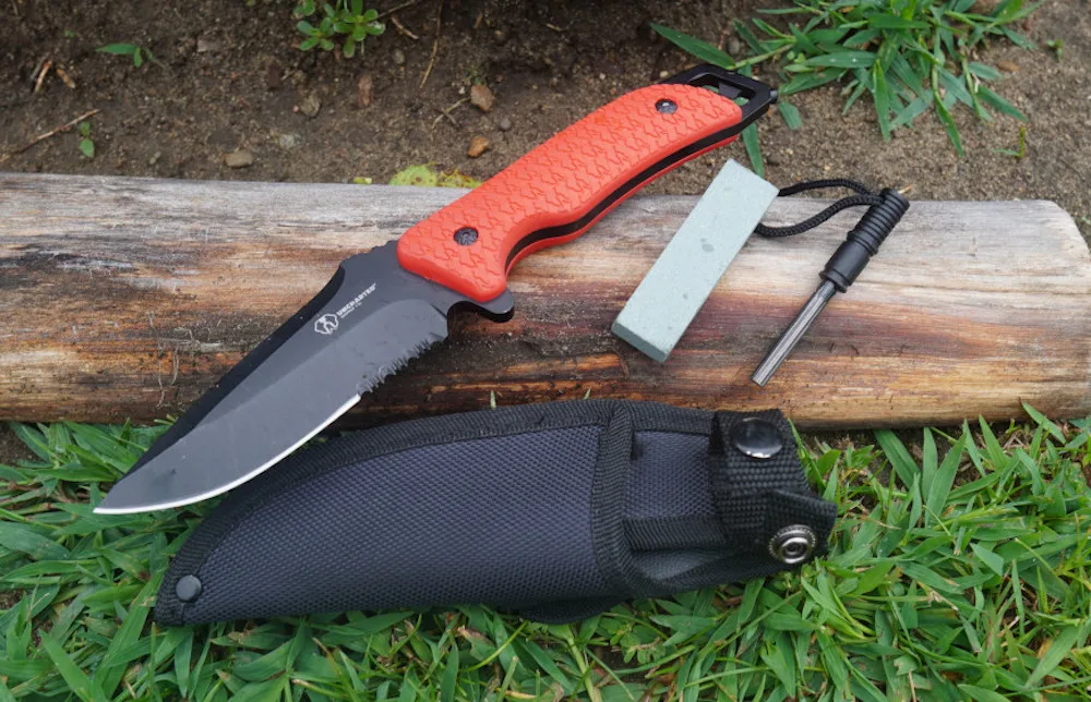 Uncharted Supply Co. Empire Knife laying on grass