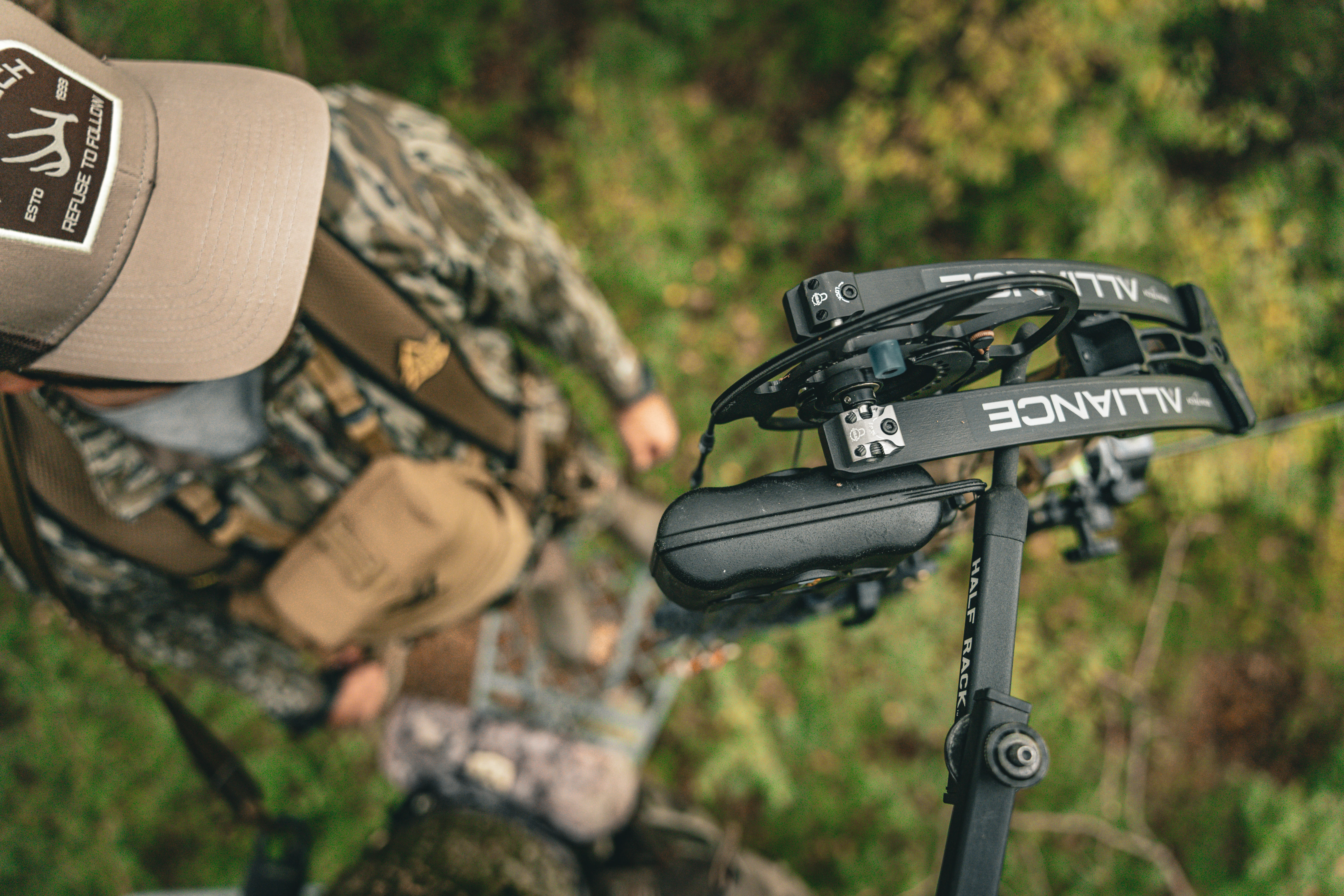 A hunter grips the new Bowtech Alliance compound bow. 