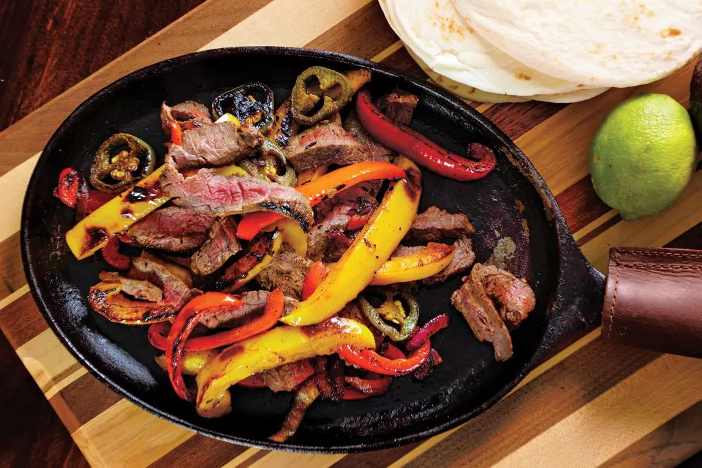 A sizzling skillet of kickin' elk fajitas.