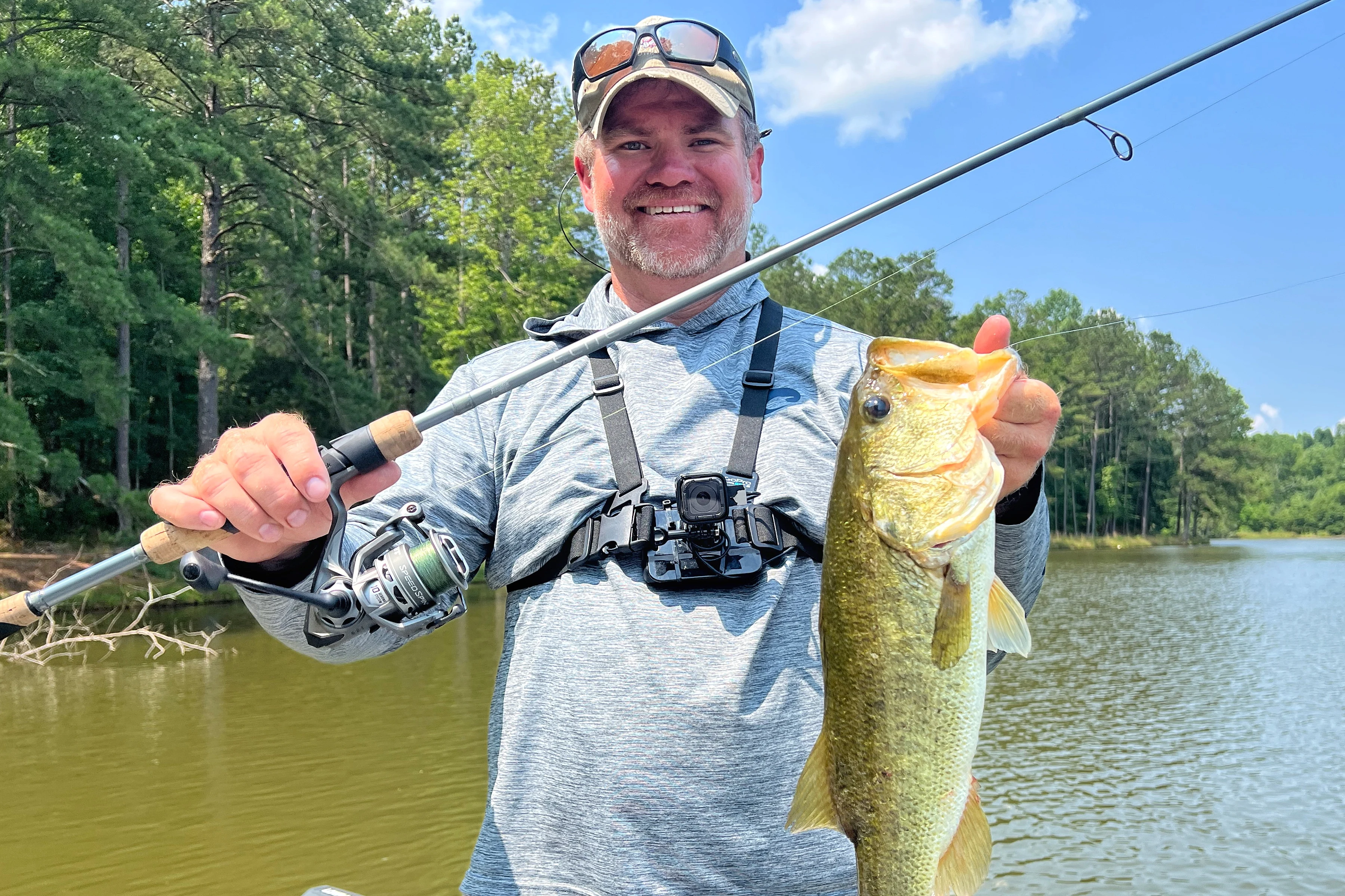 Angler holding bass