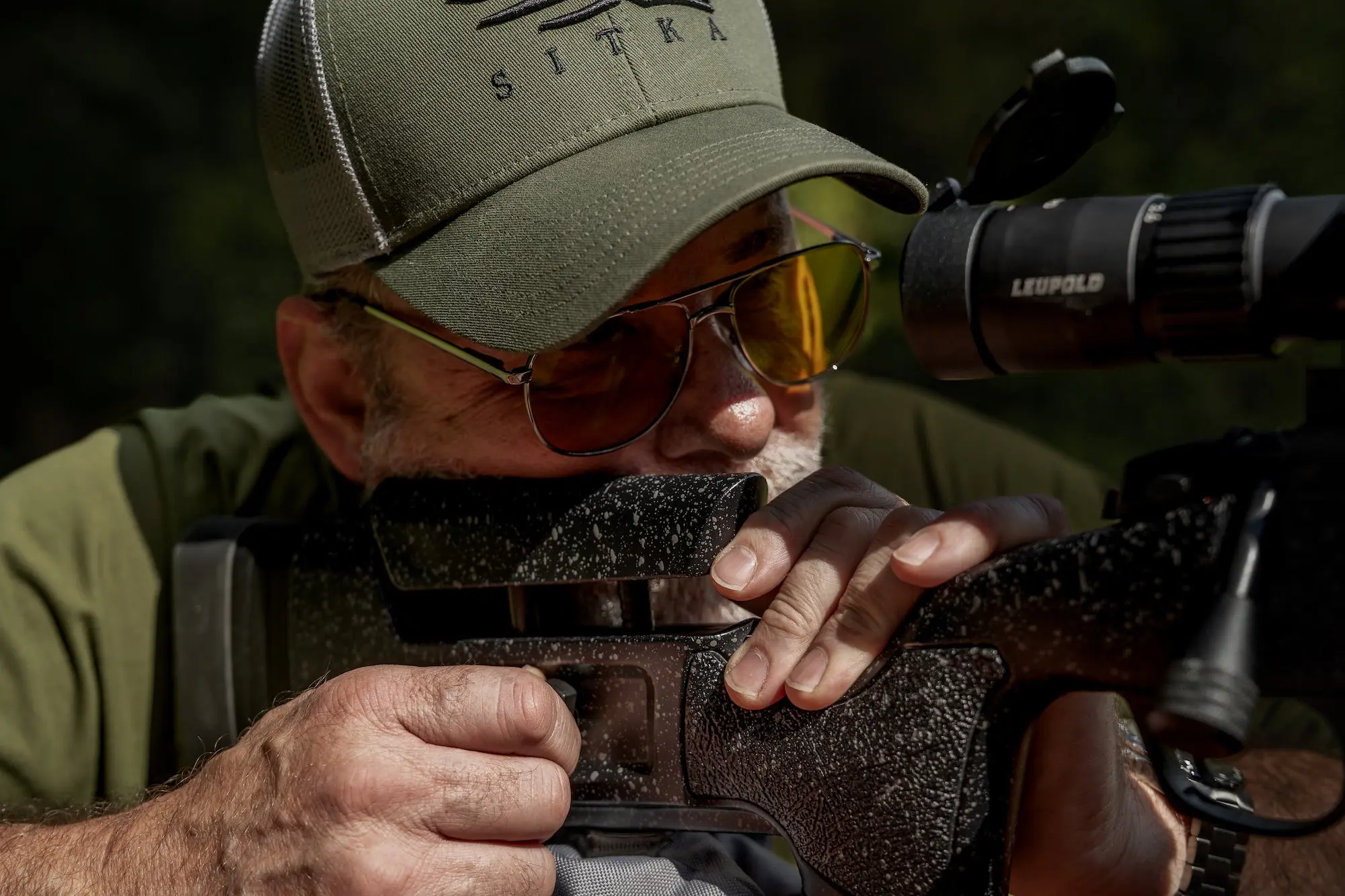 Man shooting a rifle