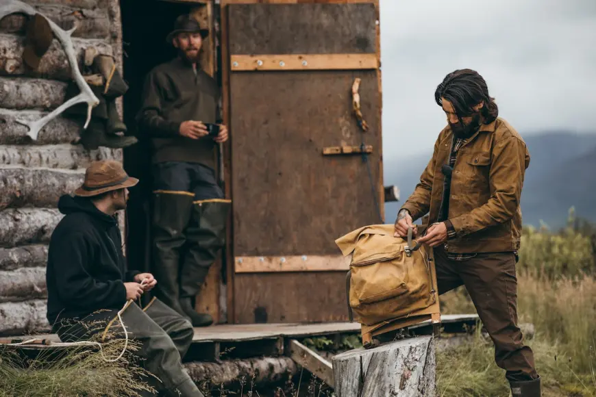 Outdoorsmen wearing Filson gear in the field