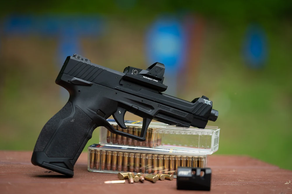 Taurus TX 22 Competition pistol sitting on table