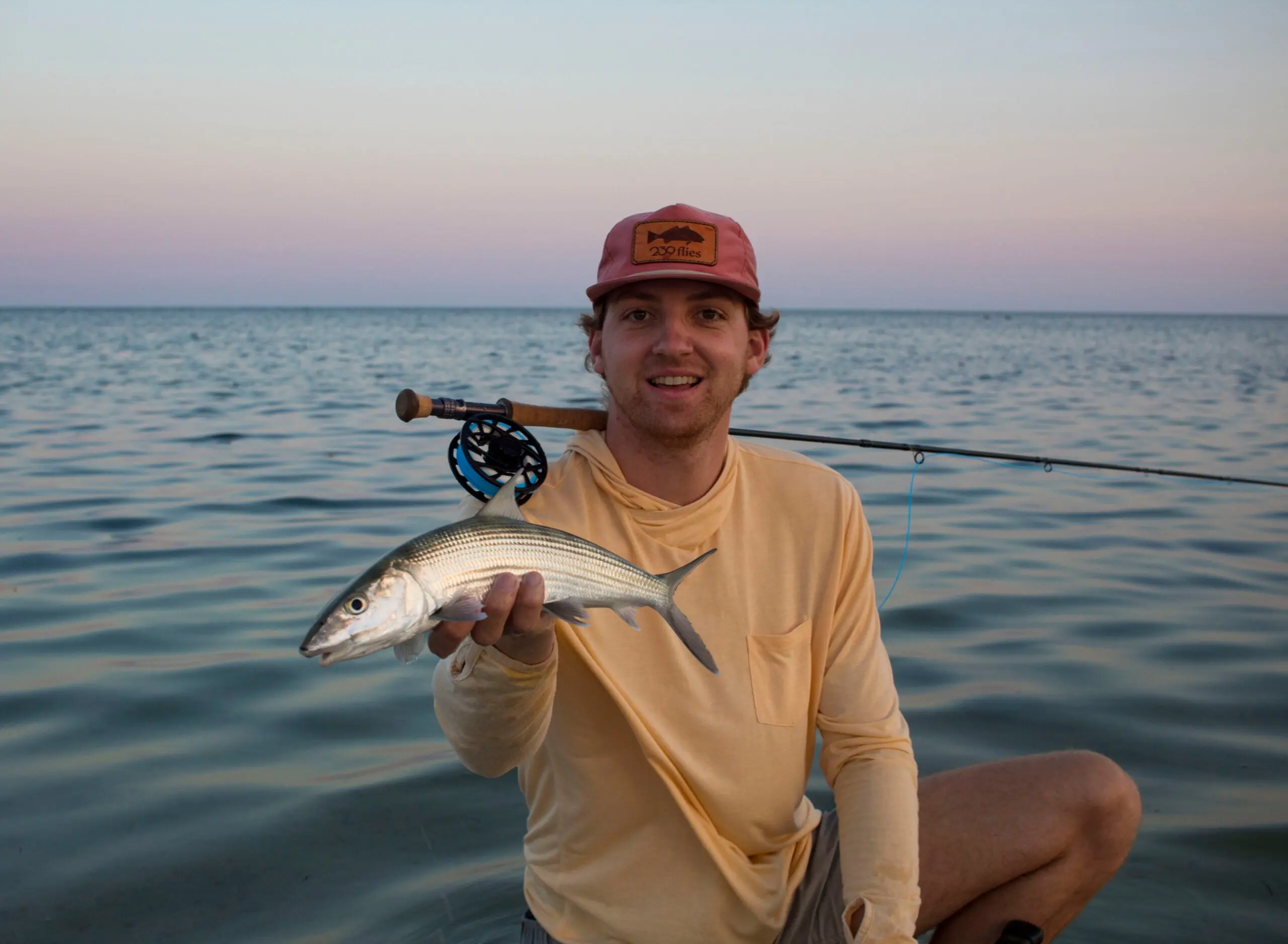 angler holding bonefish