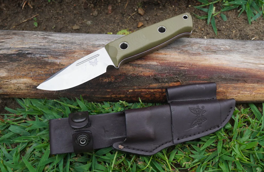 Benchmade Mini Bushcrafter laying on grass