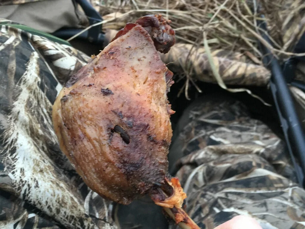 An image of cooked goose leg confit.