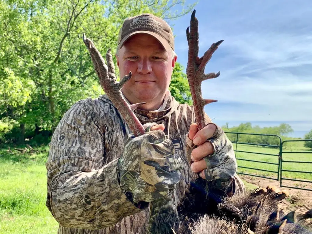 photo of hunter with turkey