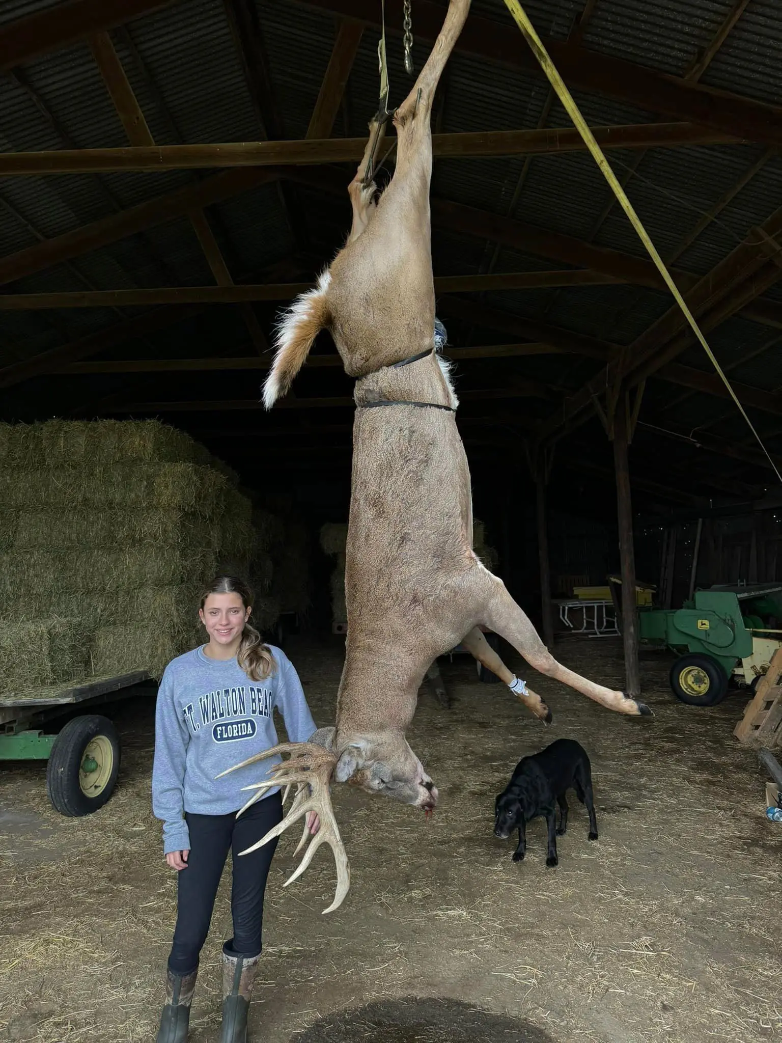 A young hunter poses with a large Indiana whitetail. 