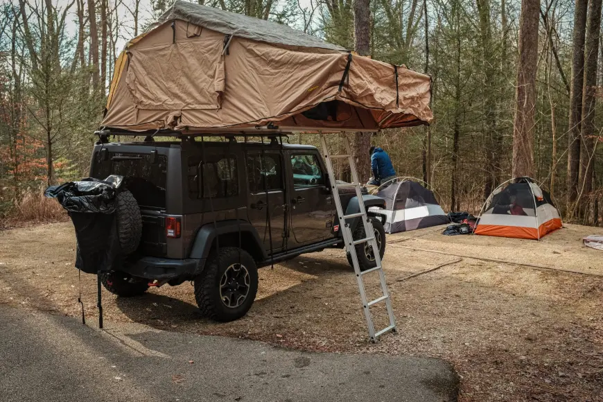 car with roof top tent