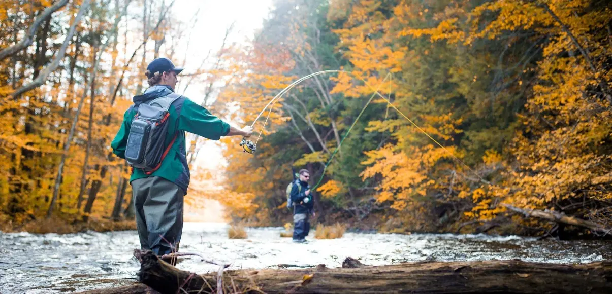 anglers fishing in river