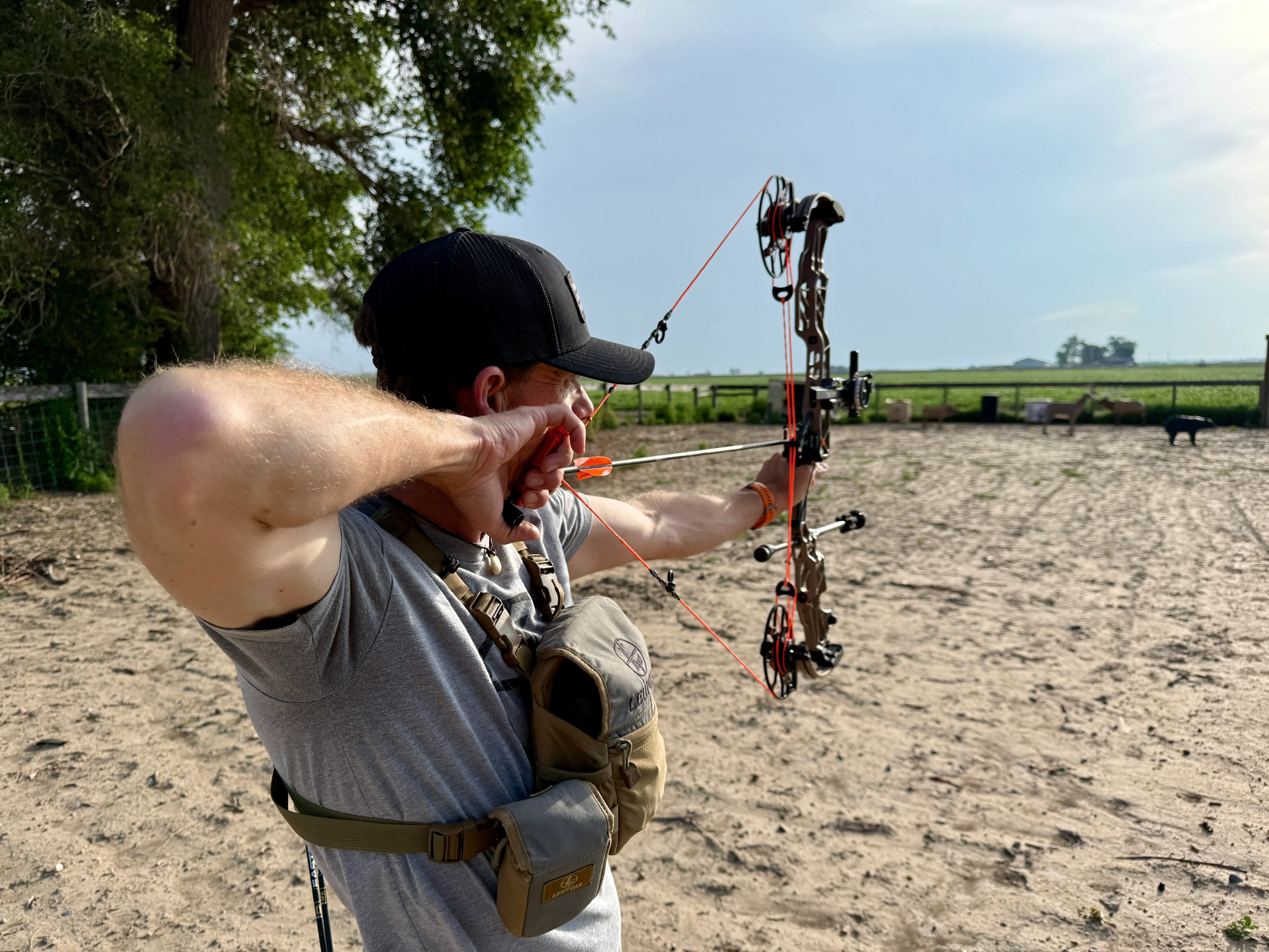An archer shoots the new Mathews Lift X compound bow on a range. 