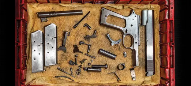 httpswww-fieldandstream-comsitesfieldandstream-comfilesimages201903parts-of-colt-1911-disassembled-2000x900-jpg