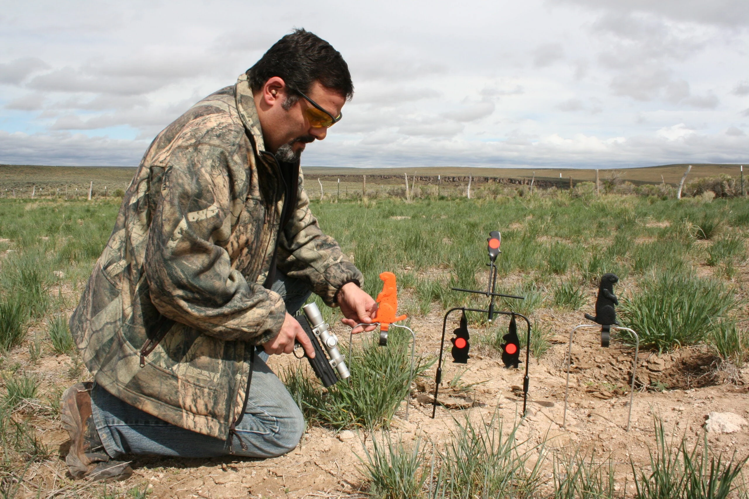 photo of a shooter plinking targets