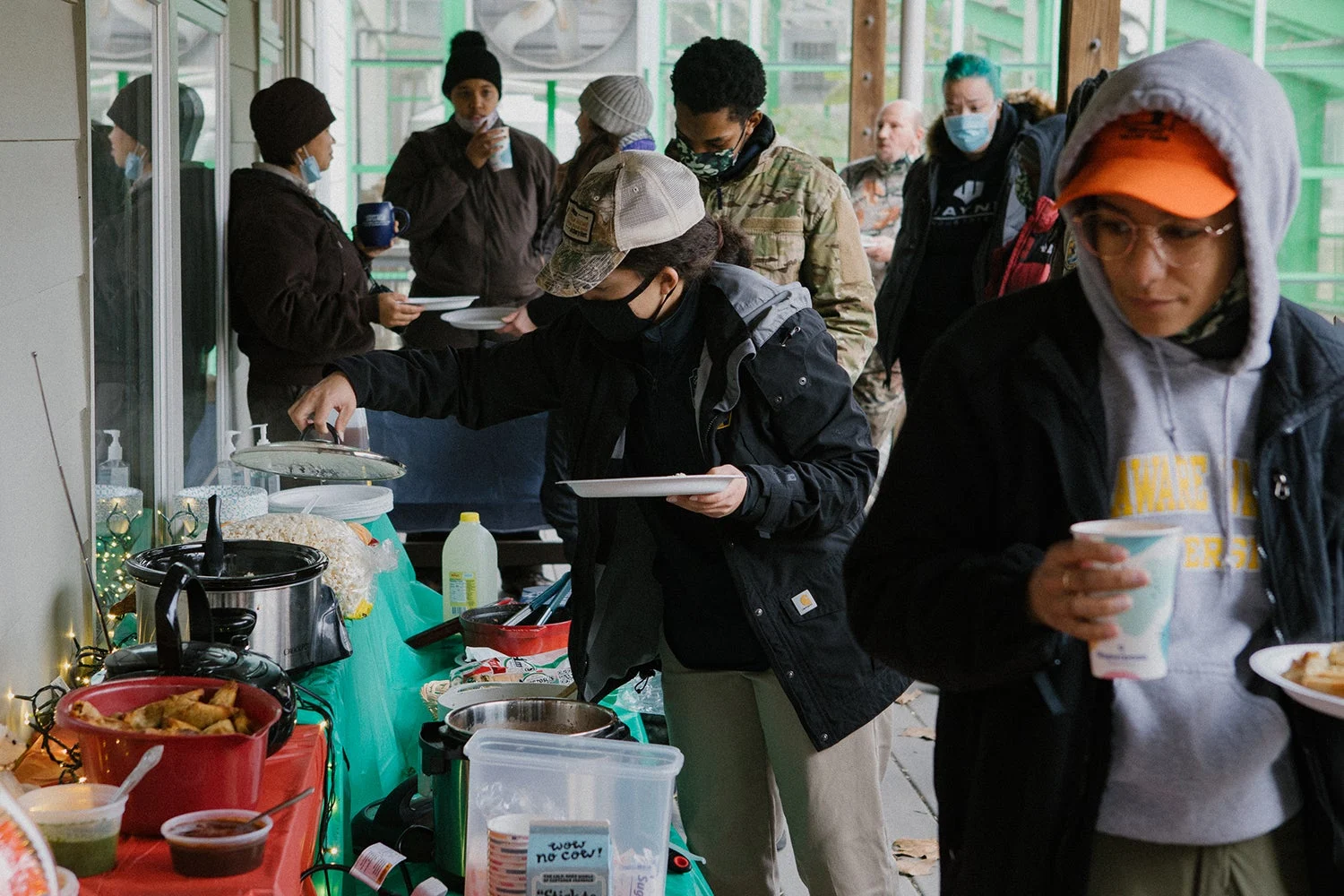 outdoorsy people getting buffet lunch