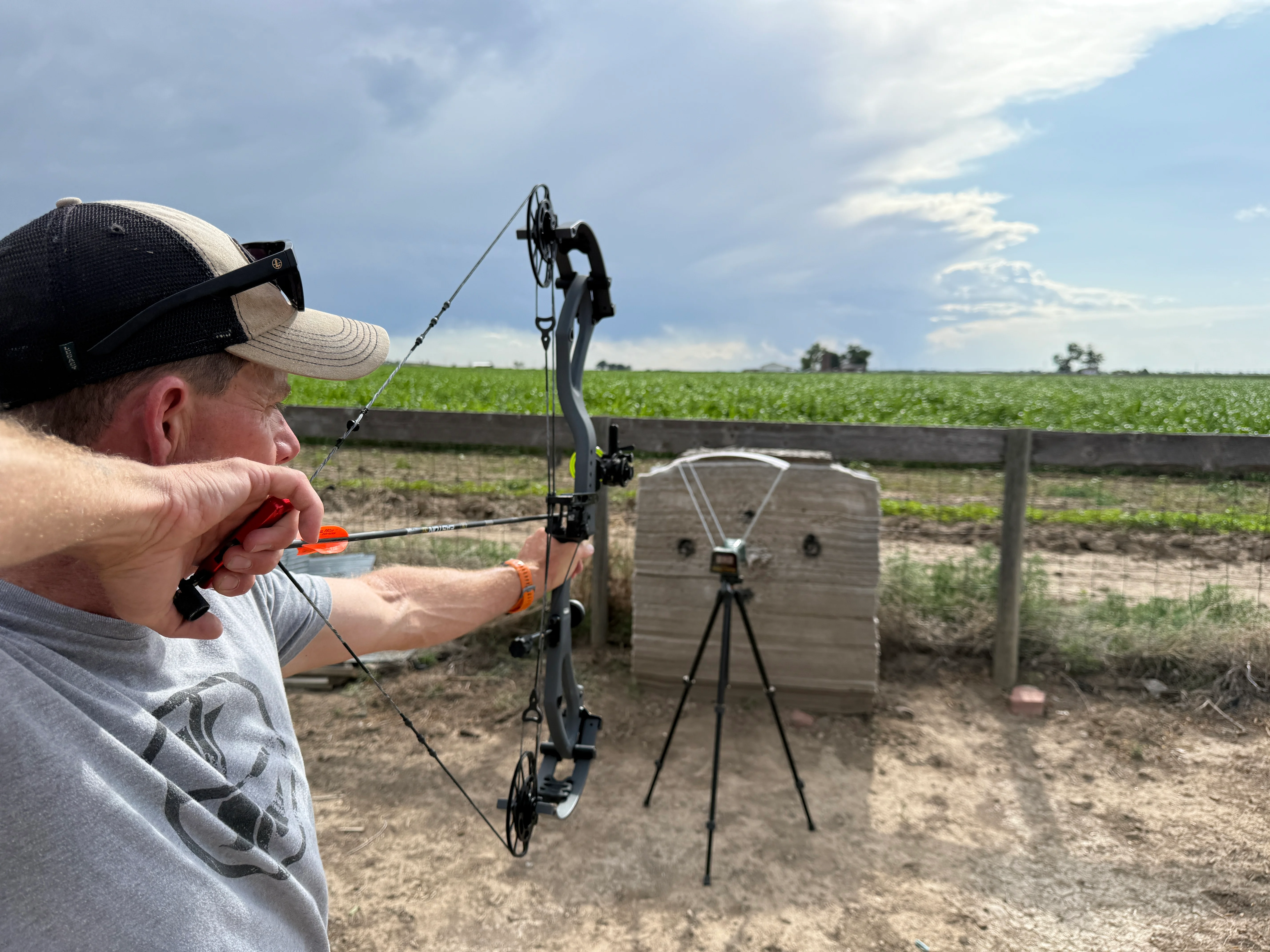 An archer shoots the new PSE Mach 33 DS bow through a chronograph. 