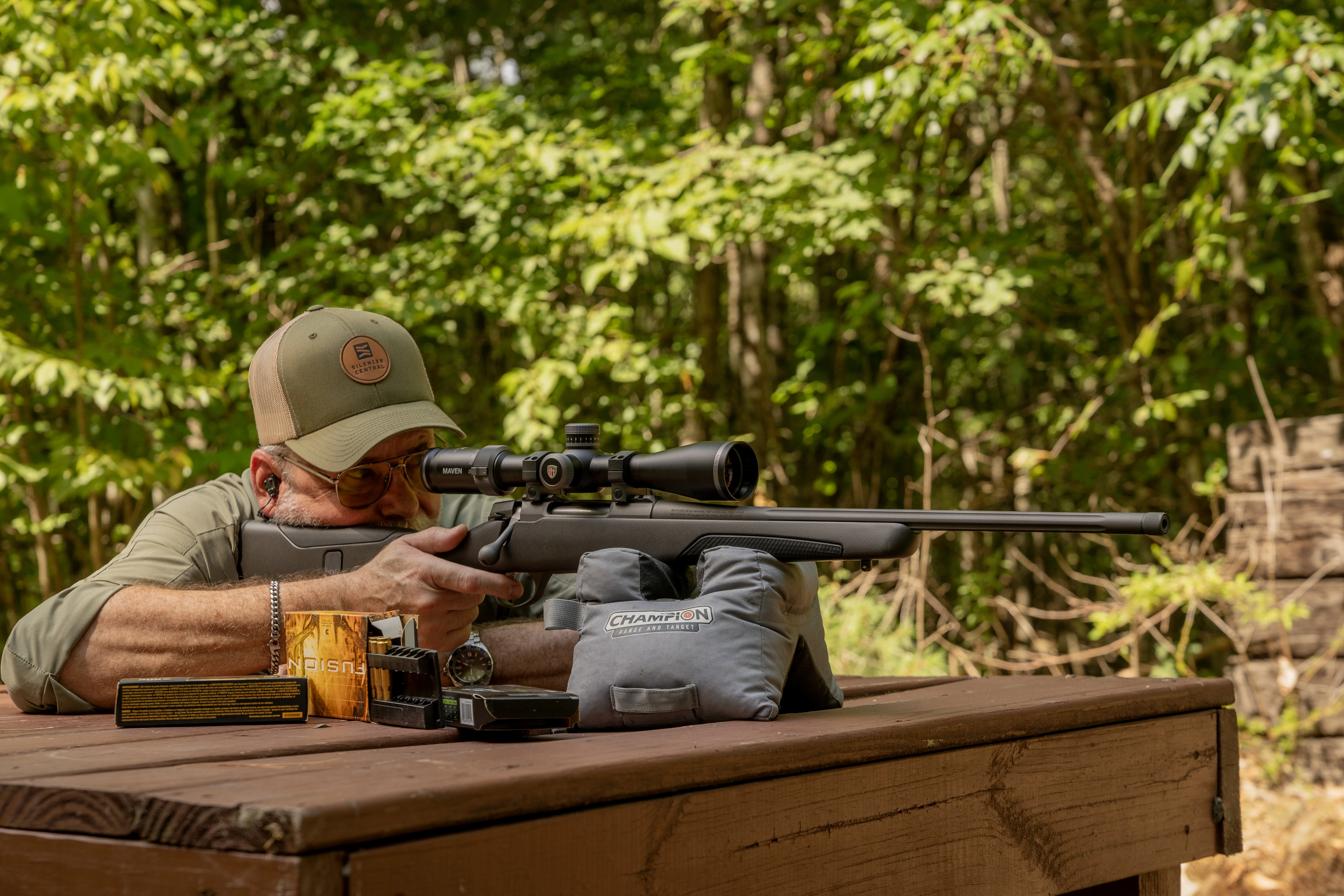 Shooter test fires the new Sako 90S Adventure from a shooting bench.