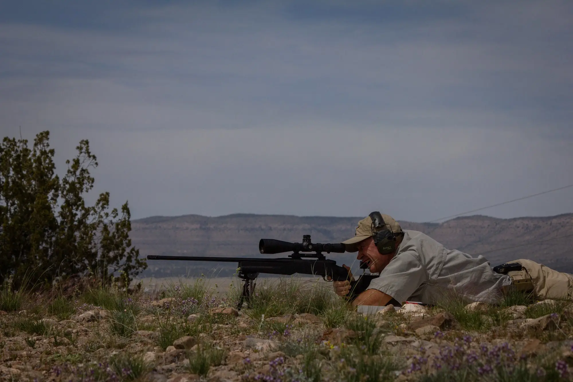 300 PRC vs 300 Win Mag: man shooting a long range rifle