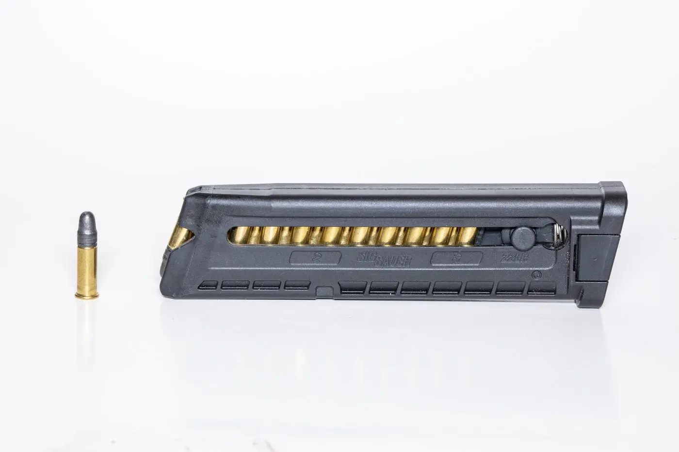 A handgun magazine filled with ammunition.