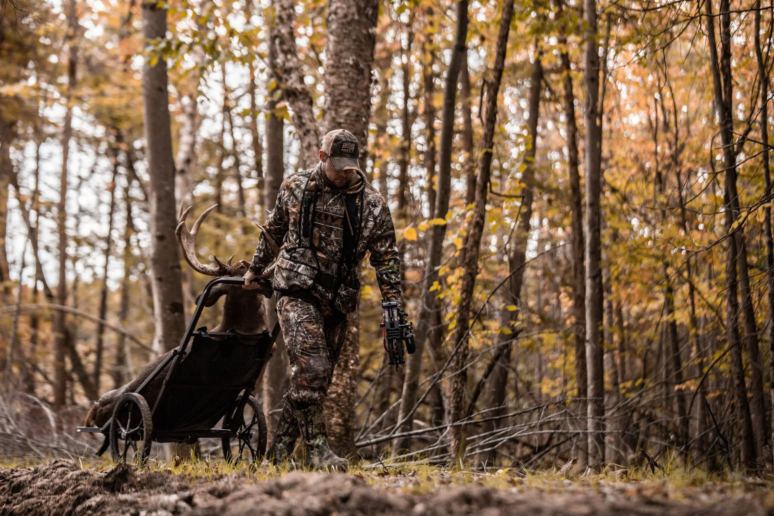 photo of hunter with deer