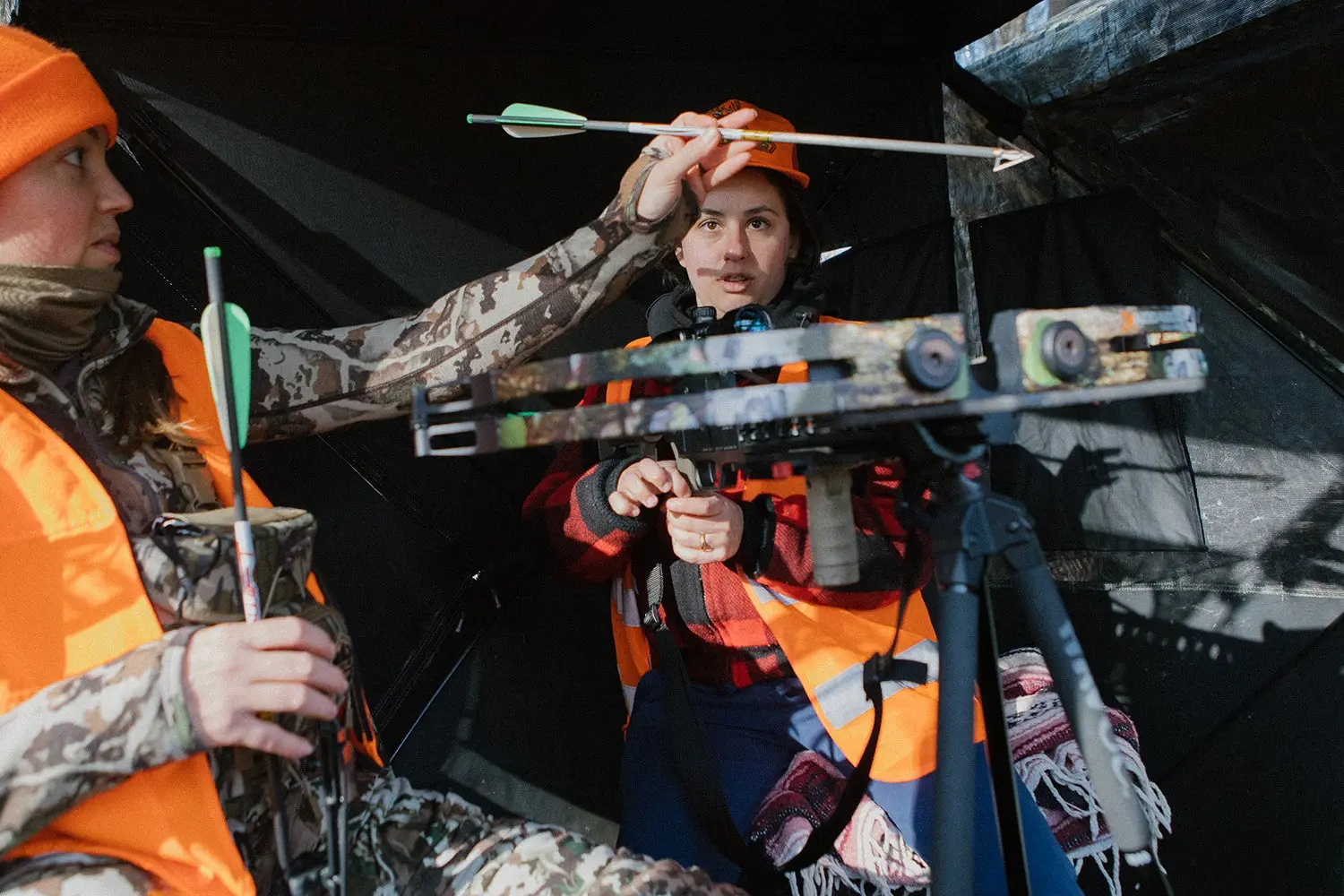 hunter instructs newbie on how to load bolt