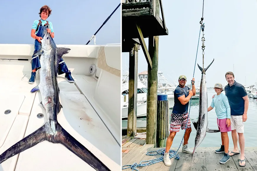 A young angler poses with a pending world-record marlin.