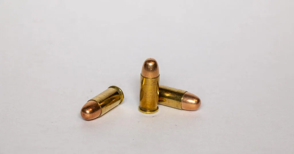 .32 ACP handgun cartridge.