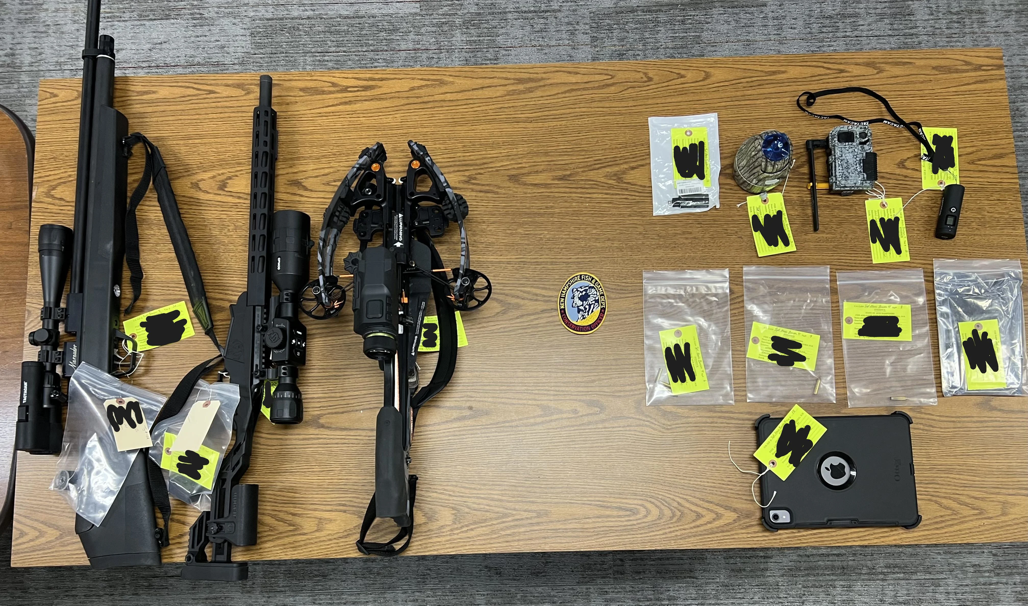 Weapons and electronics seized during a poaching investigation. 