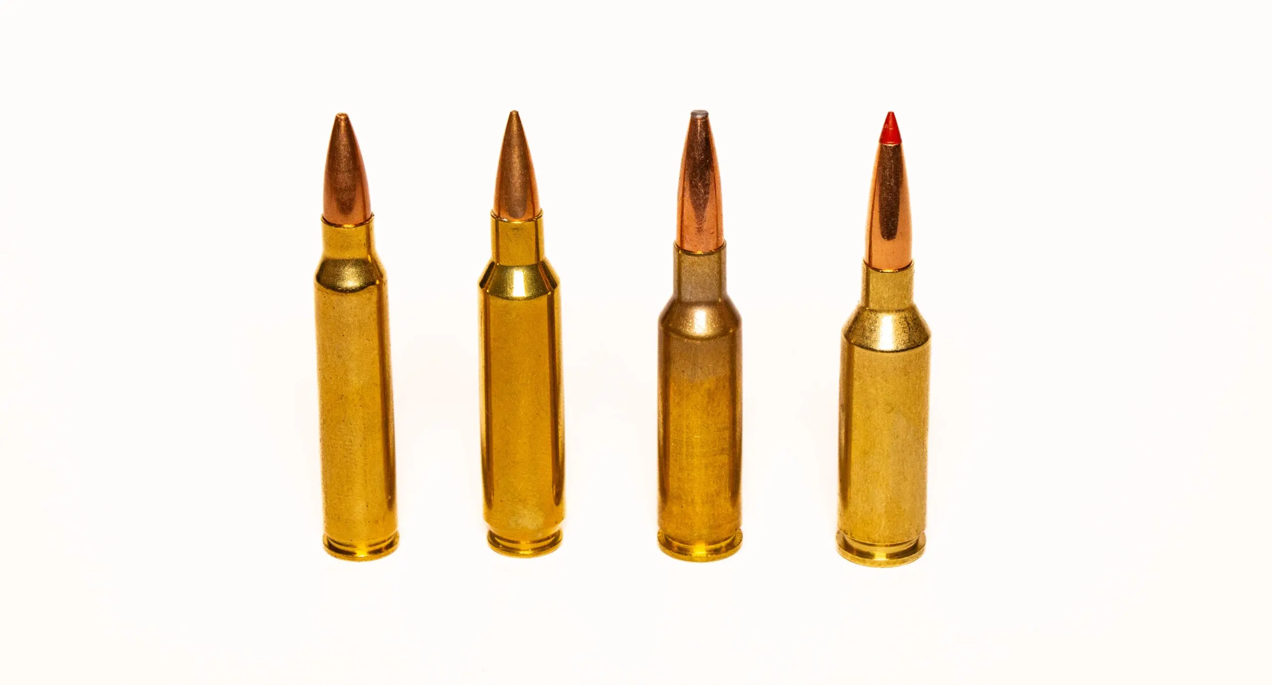 223 Remington, 22 Nosler, 224 Valkyrie, and the 22 ARC cartridges on white background