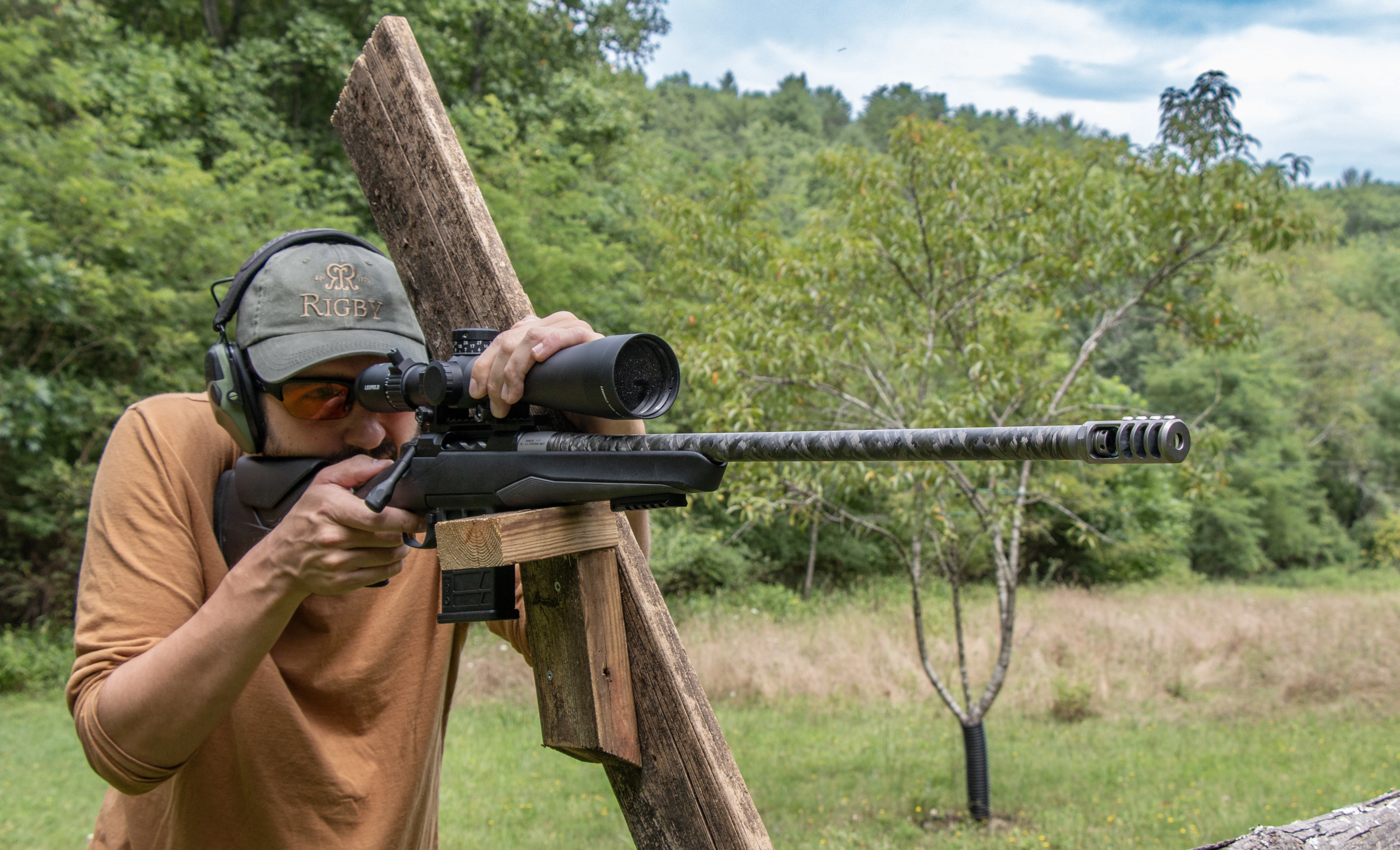 A shooter fires the new Browning X-Bolt 2 Target Lite rifle from a barricade. 