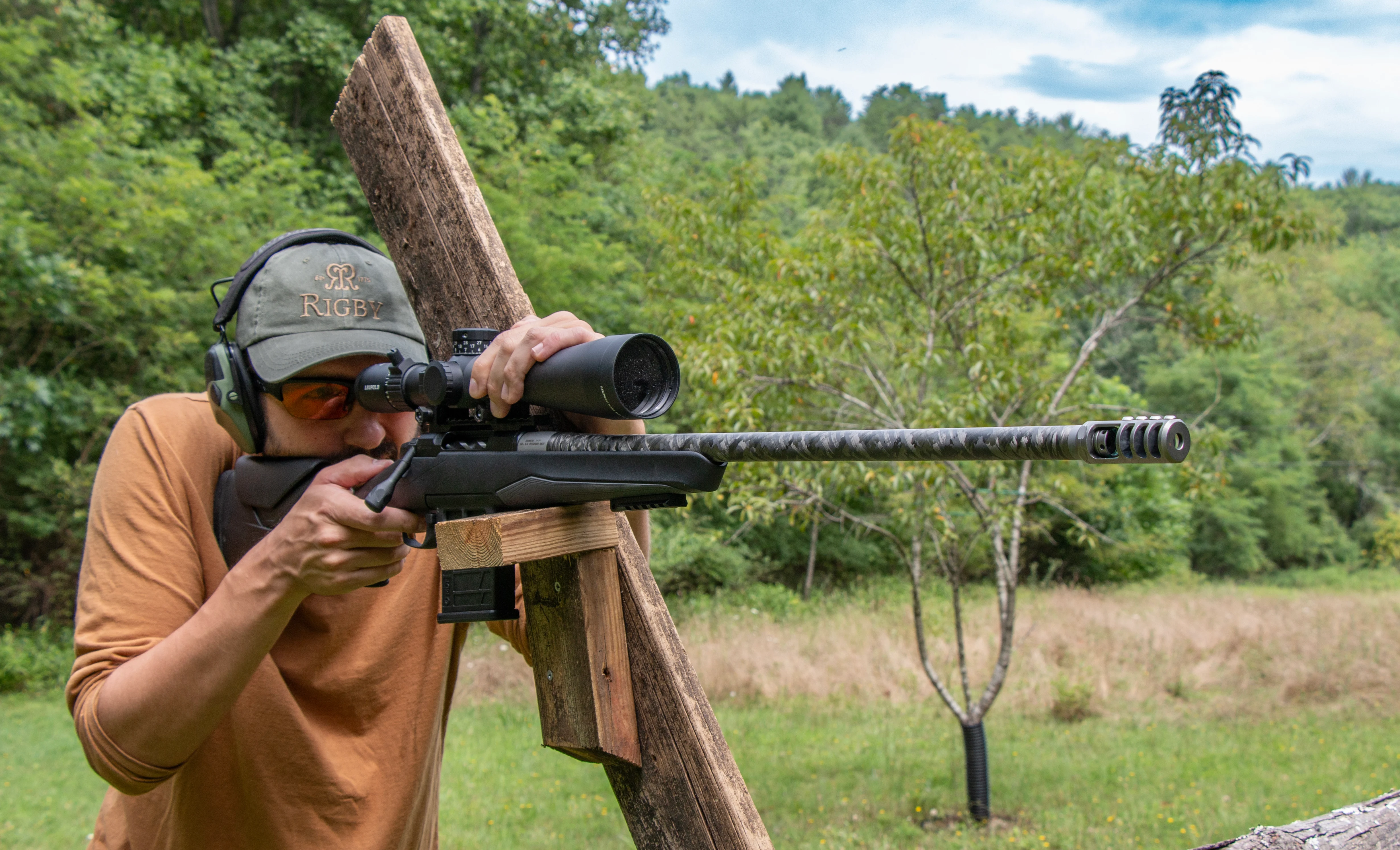 A shooter fires the new Browning X-Bolt 2 Target Lite rifle from a barricade. 