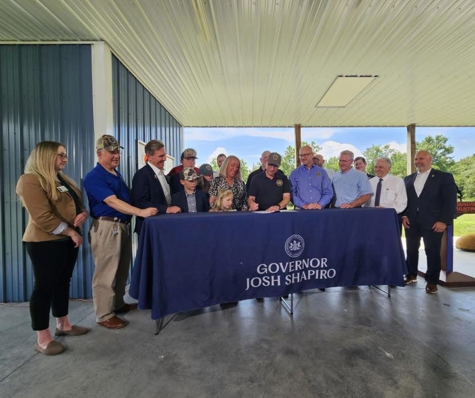 Pennsylvania Governor Josh Shapiro signs a bill repealing a ban on Sunday hunting. 