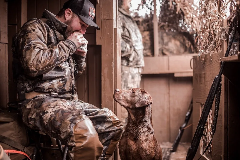 Addison Edmonds hunting with his dog Gunner