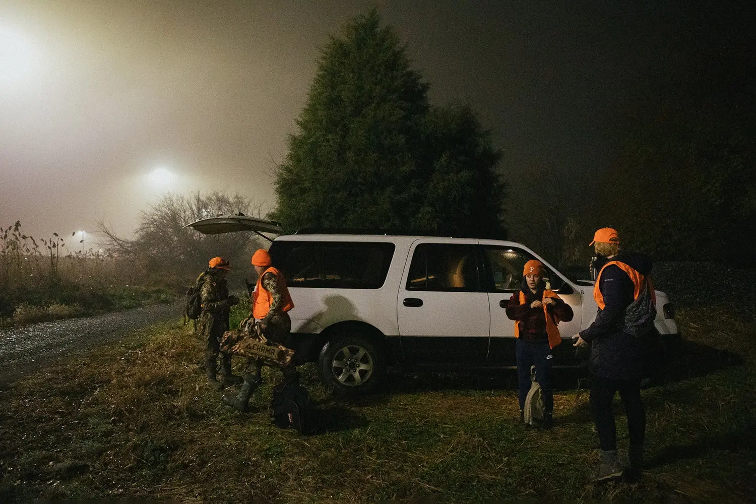 Deer hunters setting out before dawn