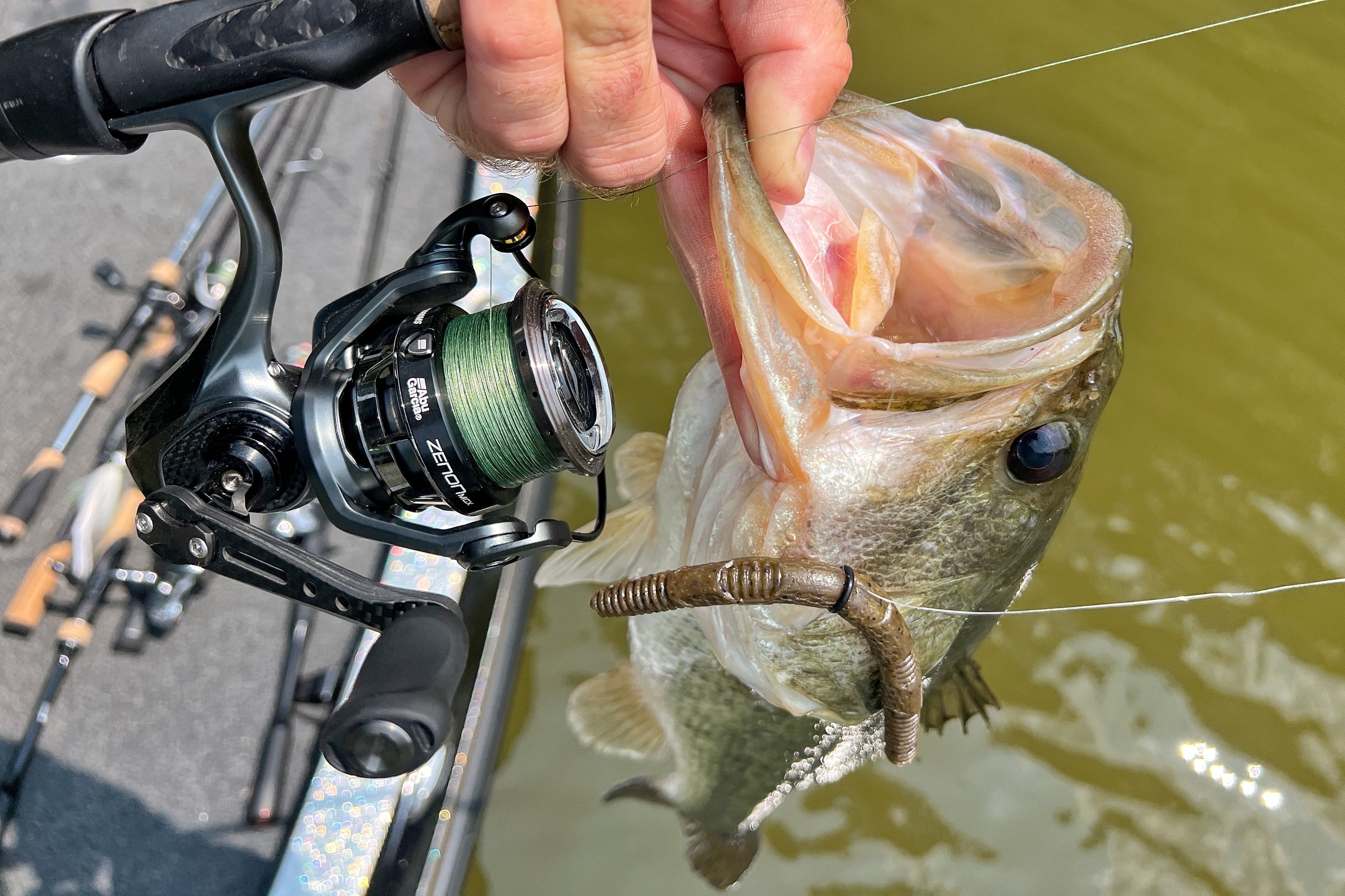 Hand holding Abu Garcia Zenon MG-X