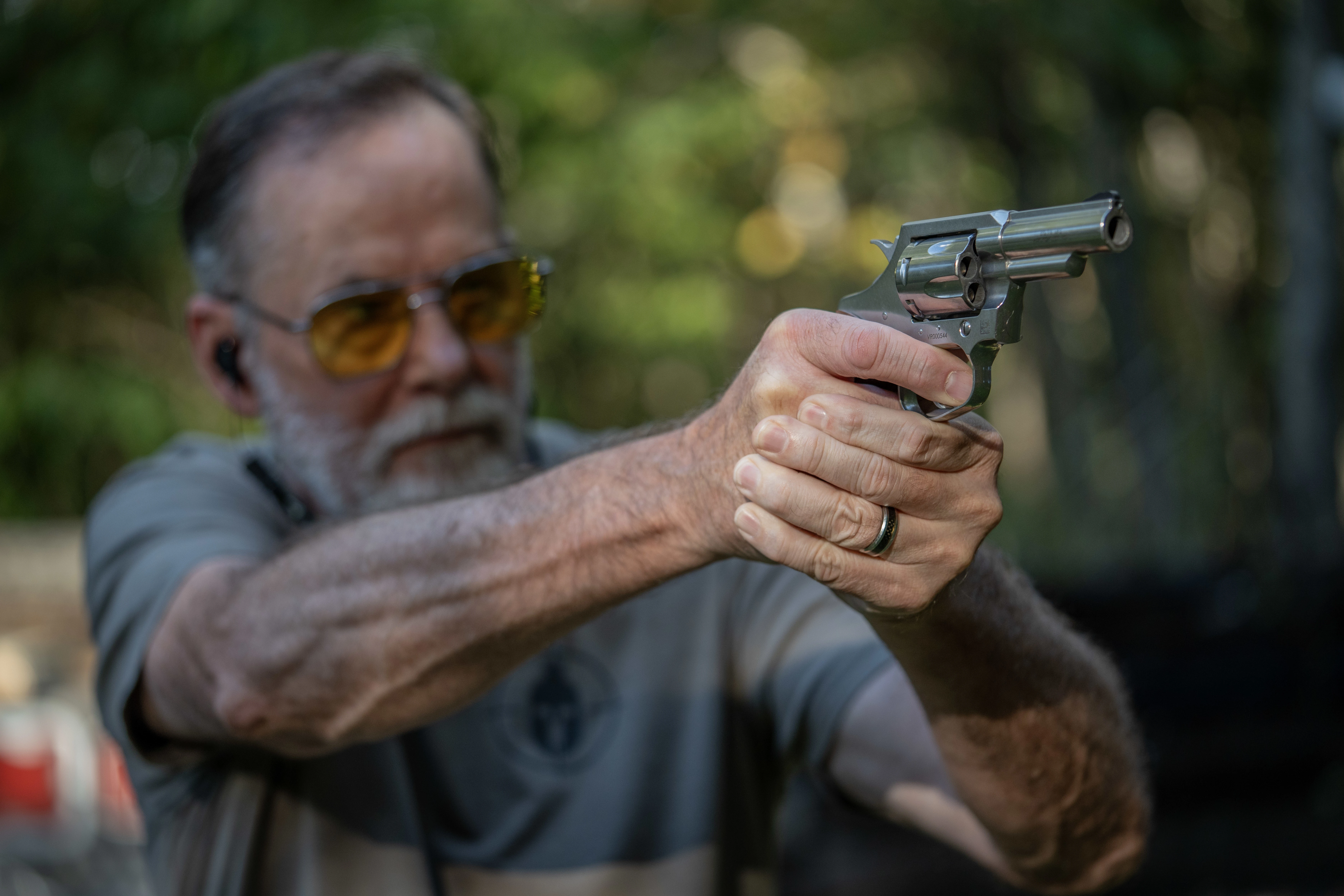 A shooter test fires a Colt Viper revolver on the range. 