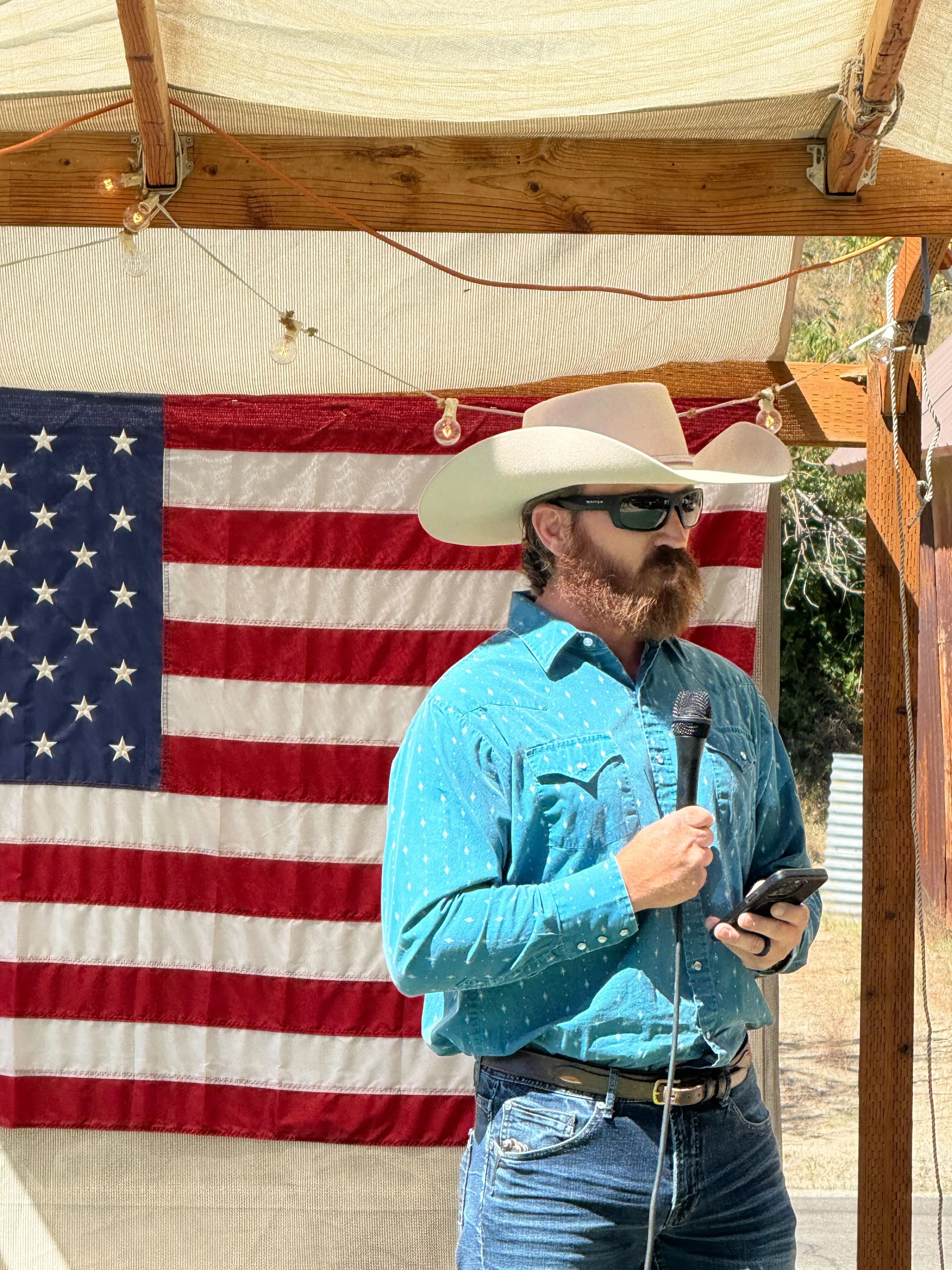 A public land advocate speaks at a rally in Idaho. 