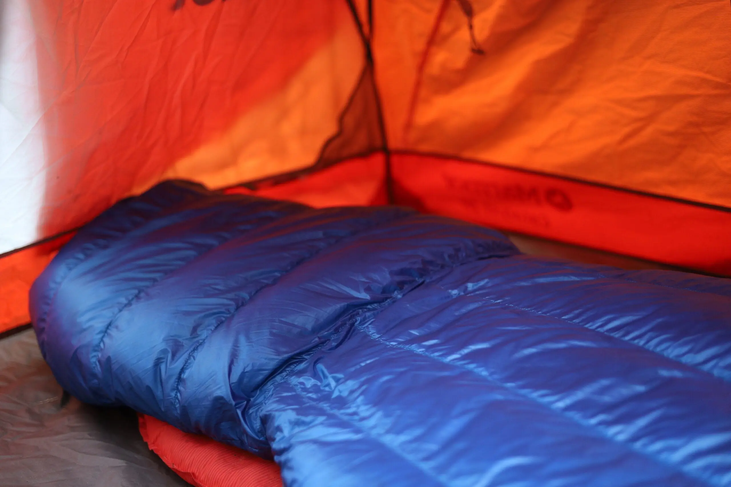 Insulated backpacking quilt in tent during testing