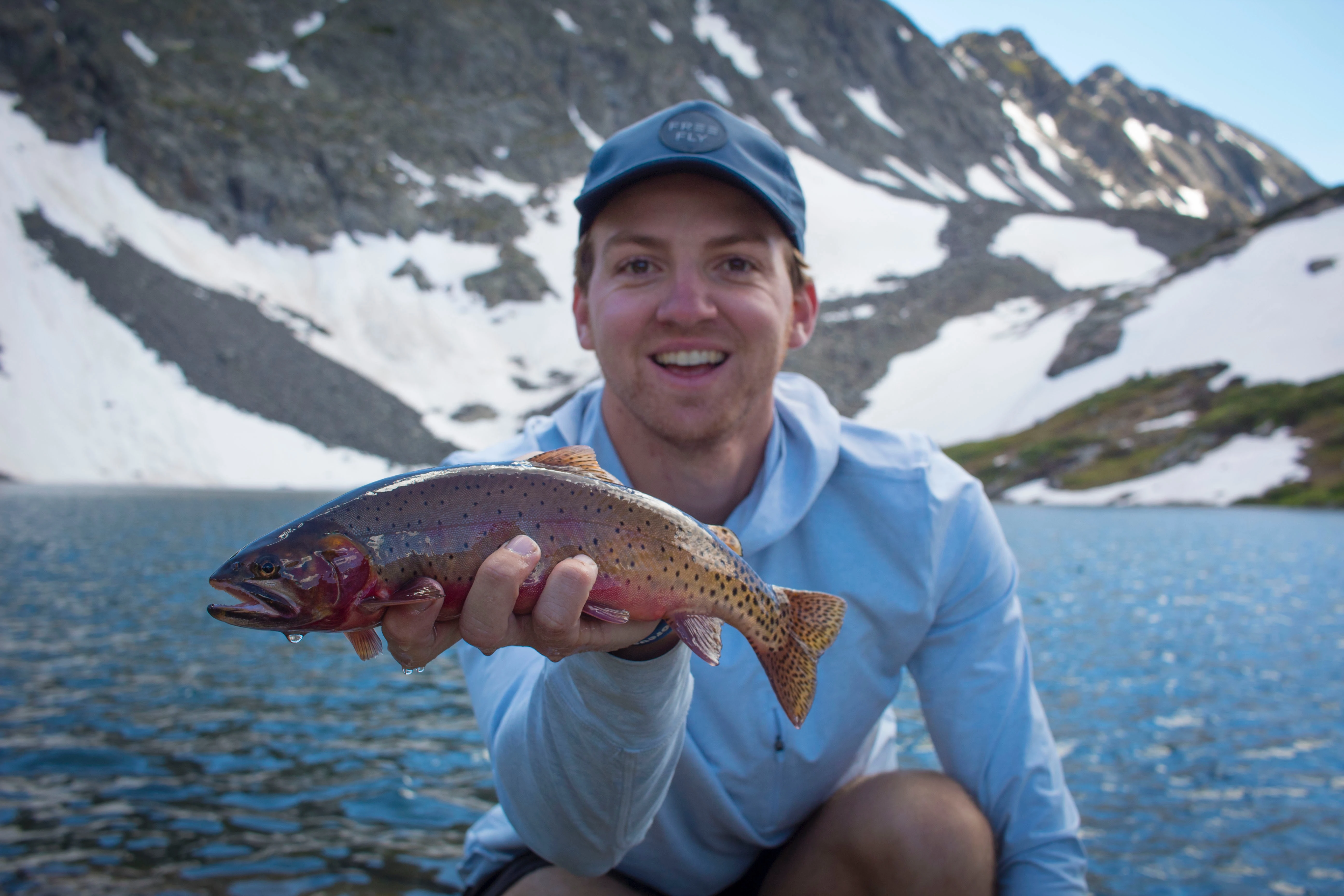 Angler holding up stillwater trout