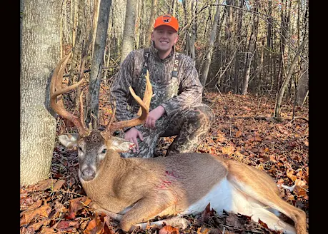 A hunter poses with a trophy whitetail taken on public land in Virginia. 