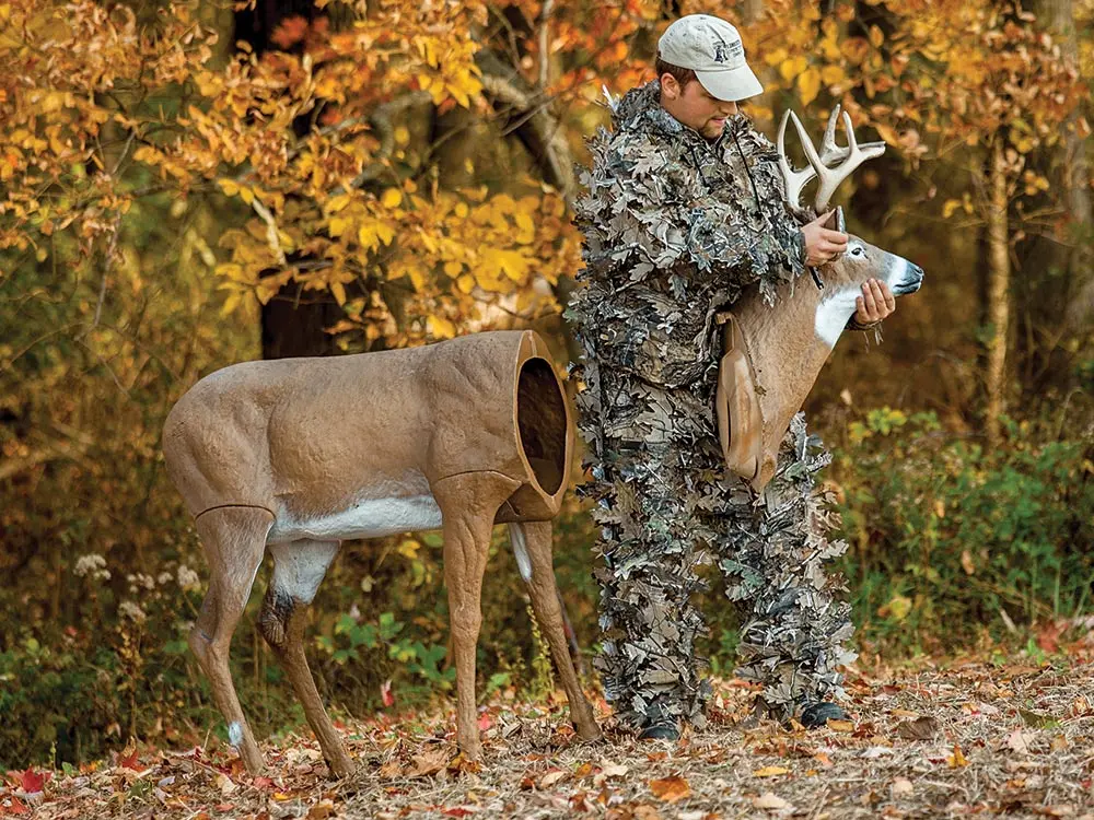 Hunter setting up a buck decoy