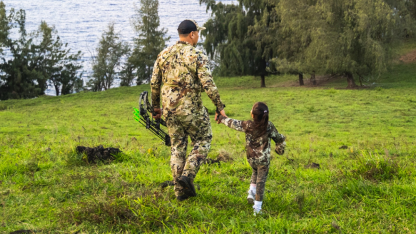 Hunter wearing Sitka gear with his young daughter