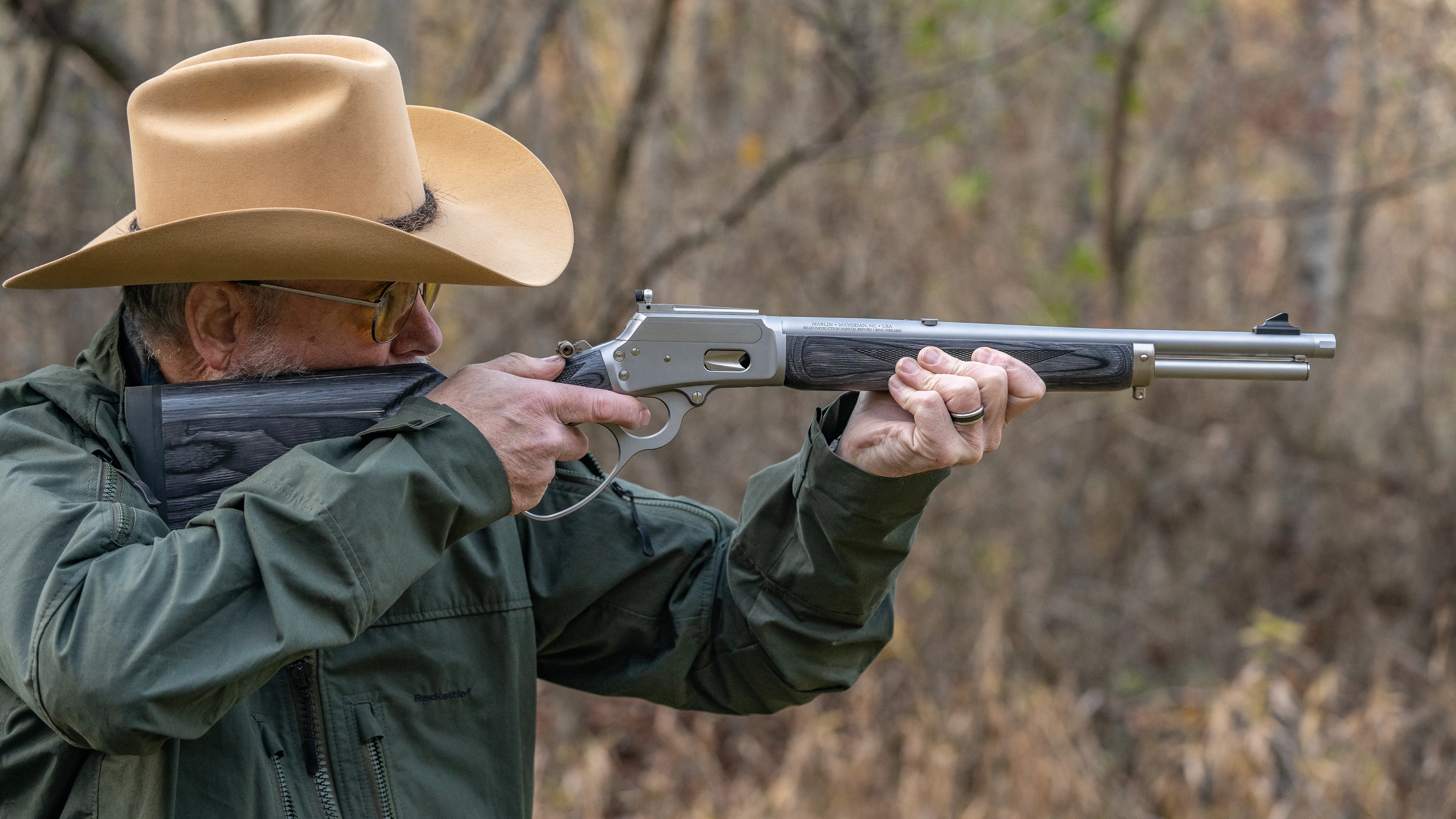 A shooter test fires the Marlin 1894 Trapper 10mm Automatic from offhand.